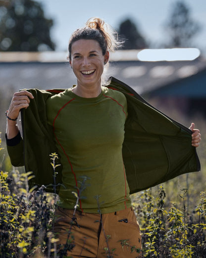 Capulet Olive Coloured Seeland Womens Hawker Base Layer on outdoor background #colour_capulet-olive