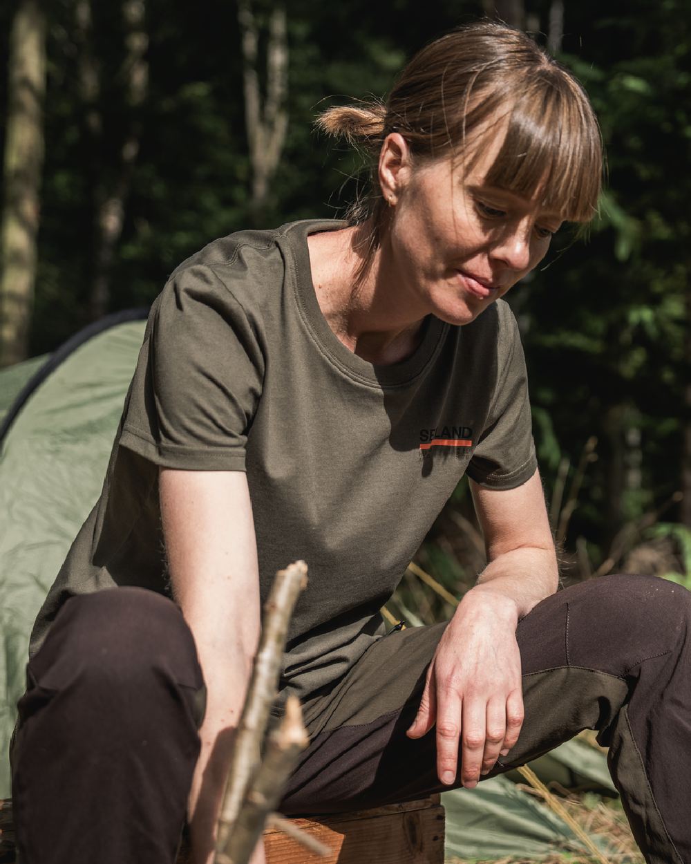 Grape Leaf Coloured Seeland Womens Leala T-Shirt on forest background #colour_grape-leaf