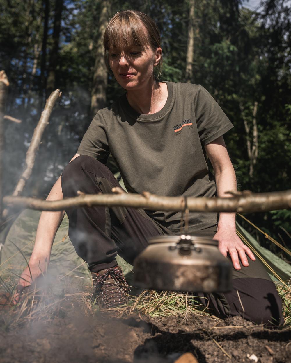 Grape Leaf Coloured Seeland Womens Leala T-Shirt on forest background #colour_grape-leaf