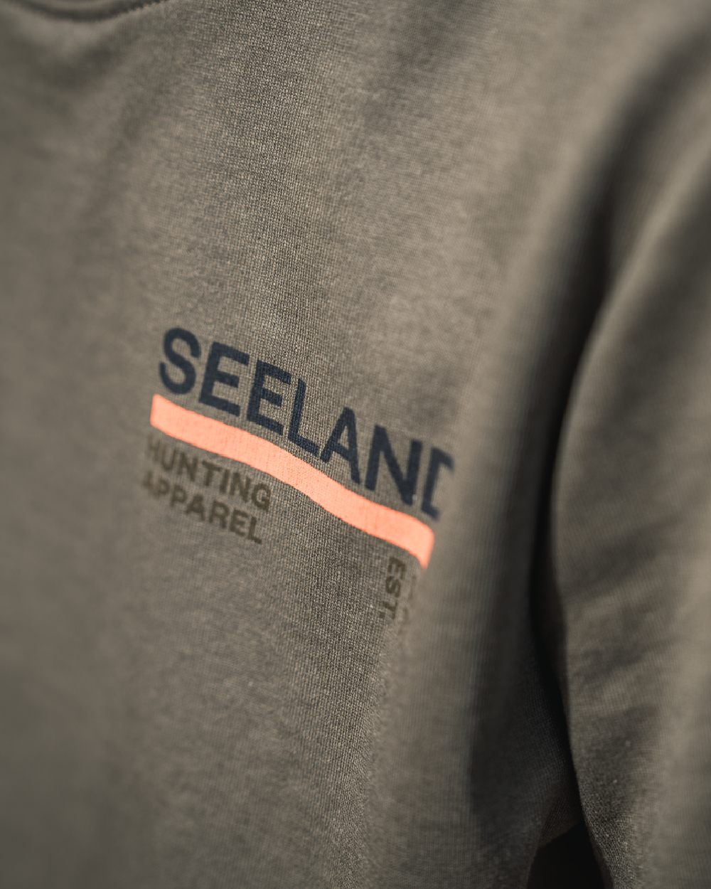 Grape Leaf Coloured Seeland Womens Leala T-Shirt on blurry background #colour_grape-leaf