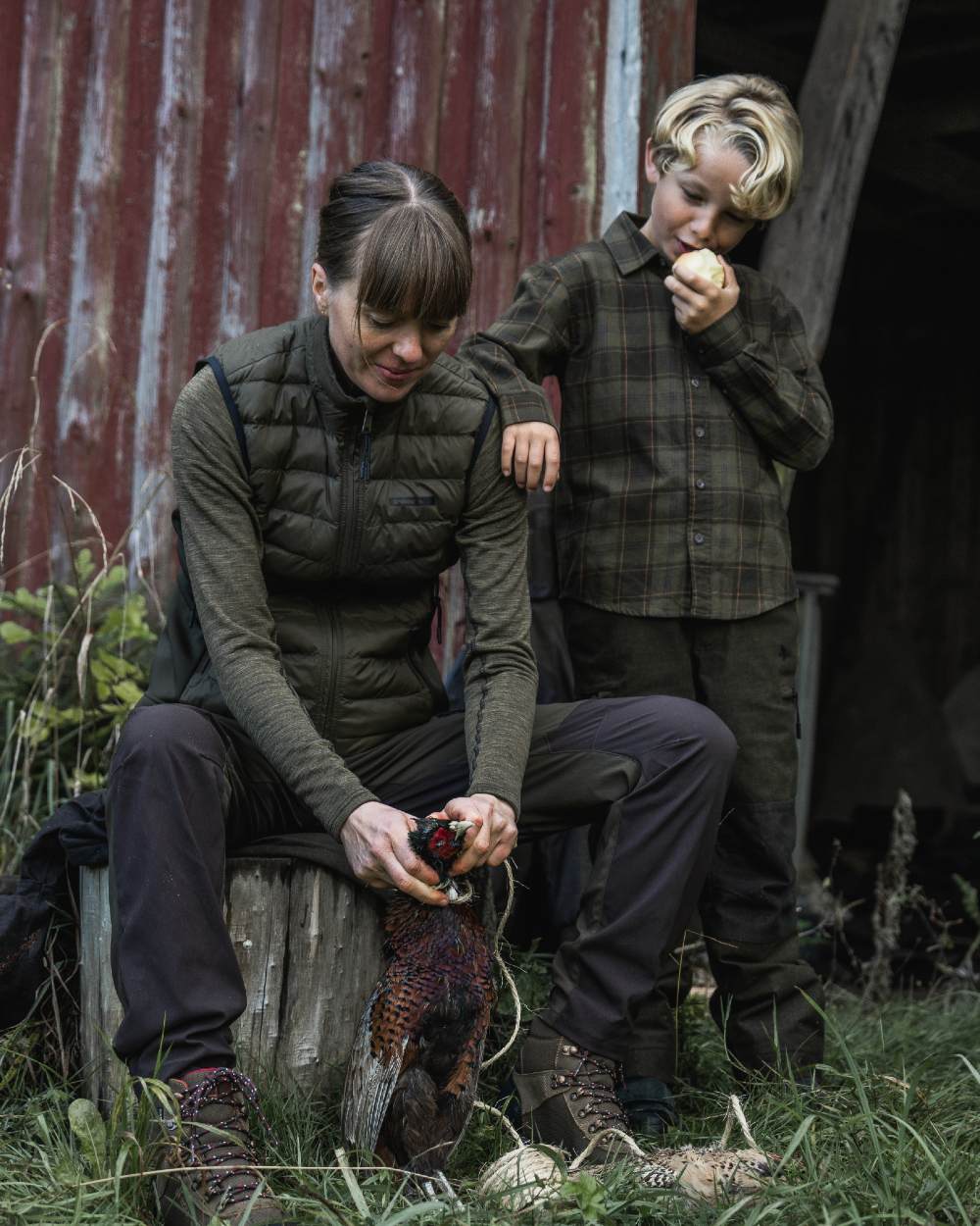 Military Olive Melange coloured Seeland Womens Peak Aia T-Shirt on forest background #colour_military-olive-melange