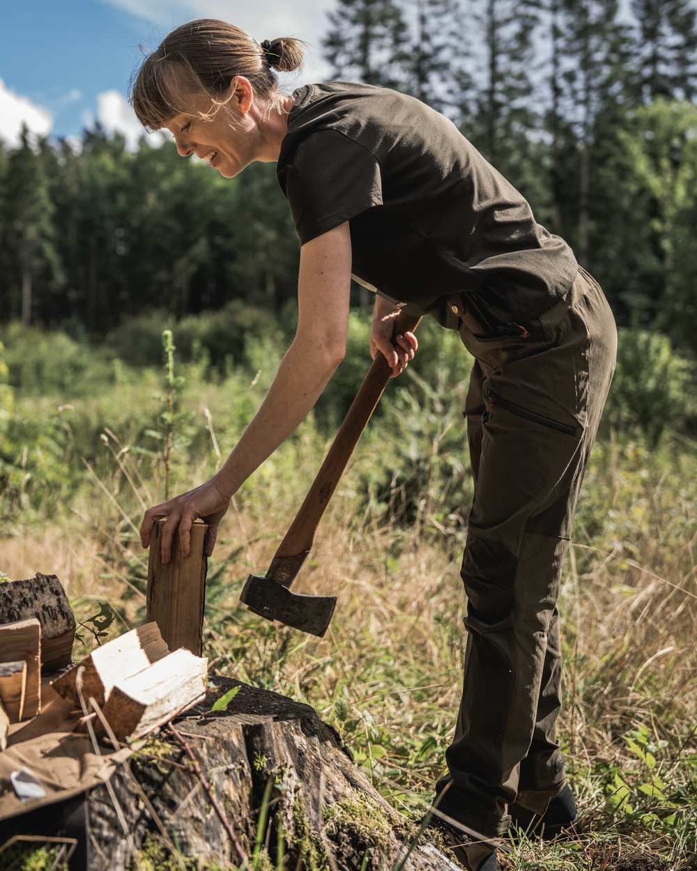 Pine Green Coloured Seeland Womens Sadie T-Shirt on forest background #colour_pine-green