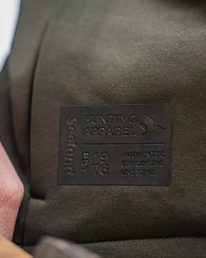 Pine Green Coloured Seeland Womens Tidal Tora Fleece Jacket on outdoor background #colour_pine-green