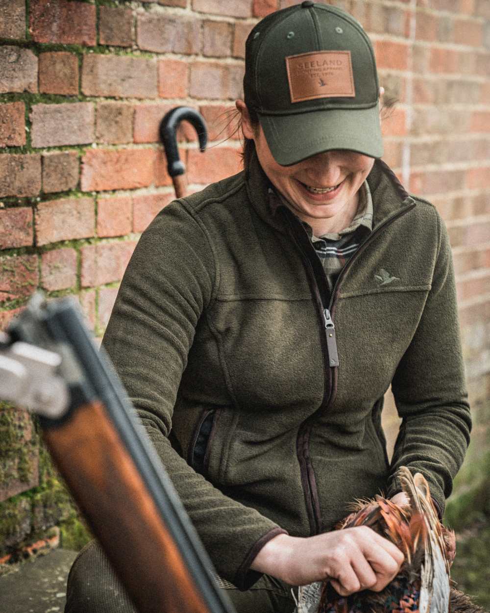 Pine Green Melange Coloured Seeland Womens Woodcock Ivy Fleece Jacket on outdoor background #colour_pine-green-melange