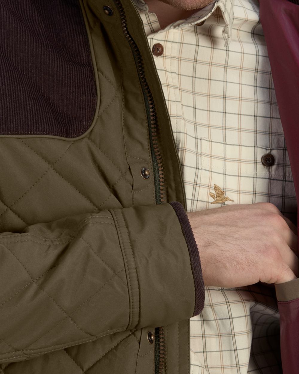 Shaded Olive Coloured Seeland Woodcock Advanced Quilted Jacket on White background #colour_shaded-olive