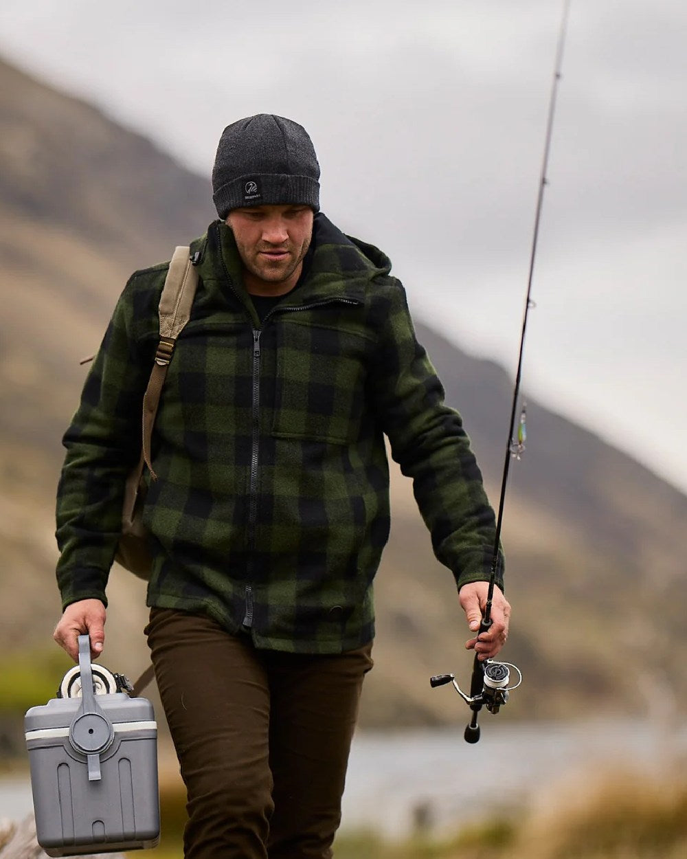 Olive Black Check Coloured Swanndri Mens Hudson Wool Hoodie on blurry background #colour_olive-black-check