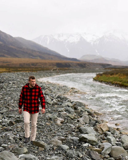 Red Black Check Coloured Swanndri Mens Hudson Wool Hoodie on river background #colour_red-black-check