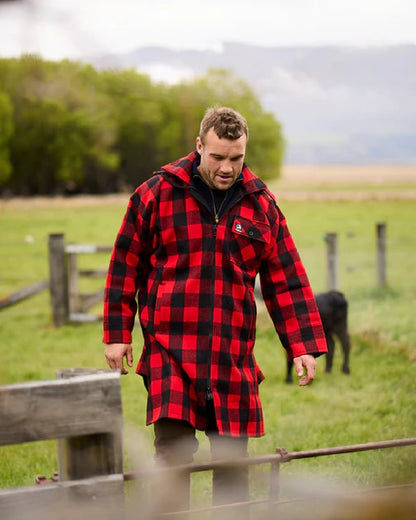 Red Black Check Coloured Swanndri Mens Mosgiel Wool Bushshirt with Zip-up Front on countryside background #colour_red-black-check