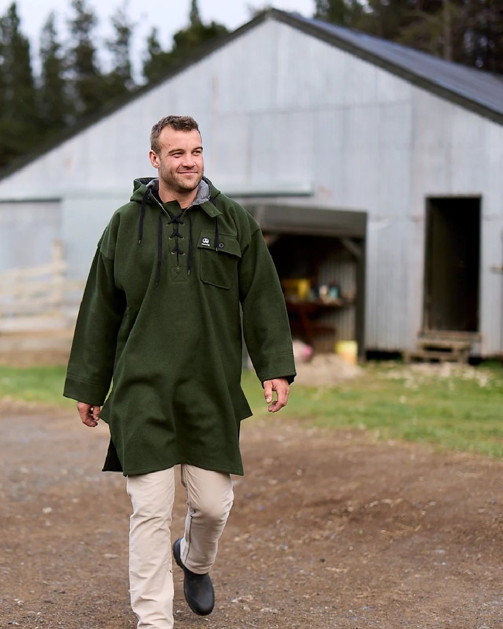 Olive Coloured Swanndri Mens Original Wool Bushshirt With Lace-Up Front on house background #colour_olive