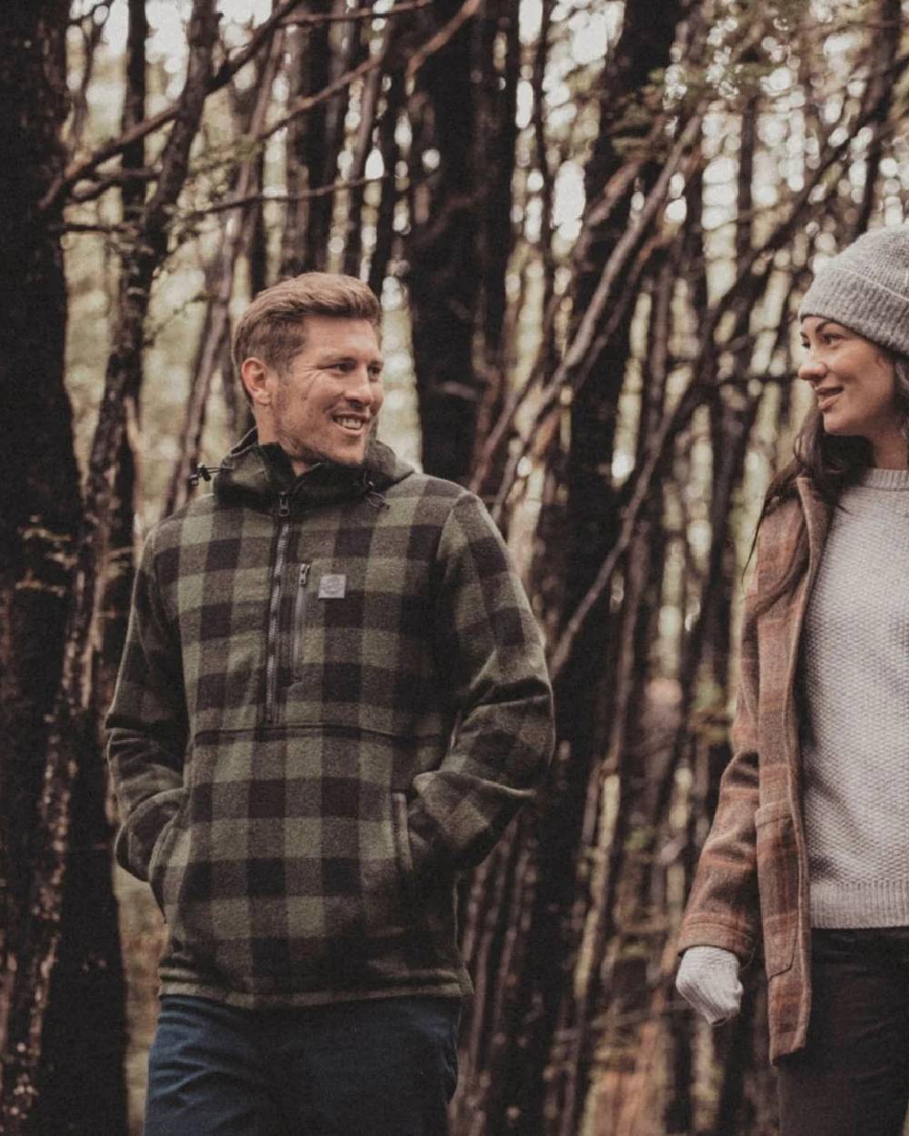 Olive Black Check Coloured Swanndri Mens Reidston Wool Anorak on forest background #colour_olive-black-check