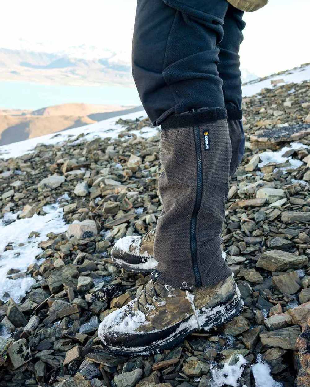 Black Coloured Swazi Ali-Gaiters on outdoor background #colour_black