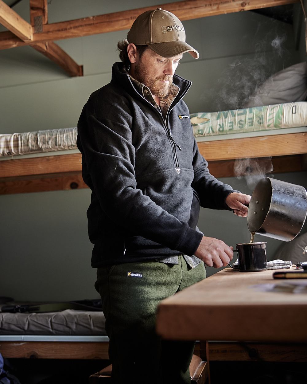 Black Coloured Swazi Doughroaster on wood background #colour_black