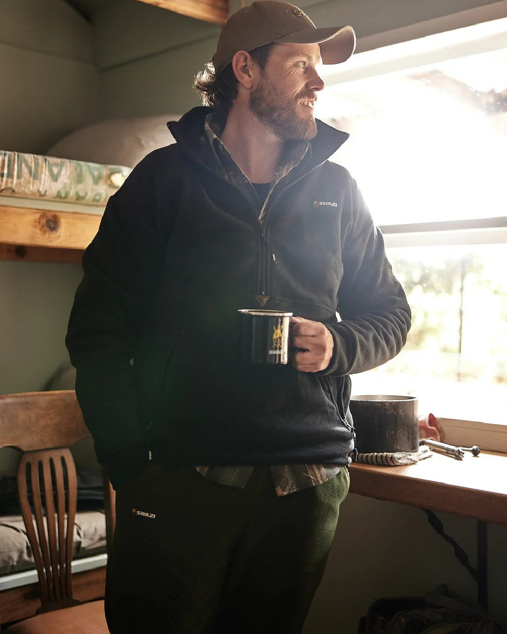 Black Coloured Swazi Doughroaster on wood background #colour_black