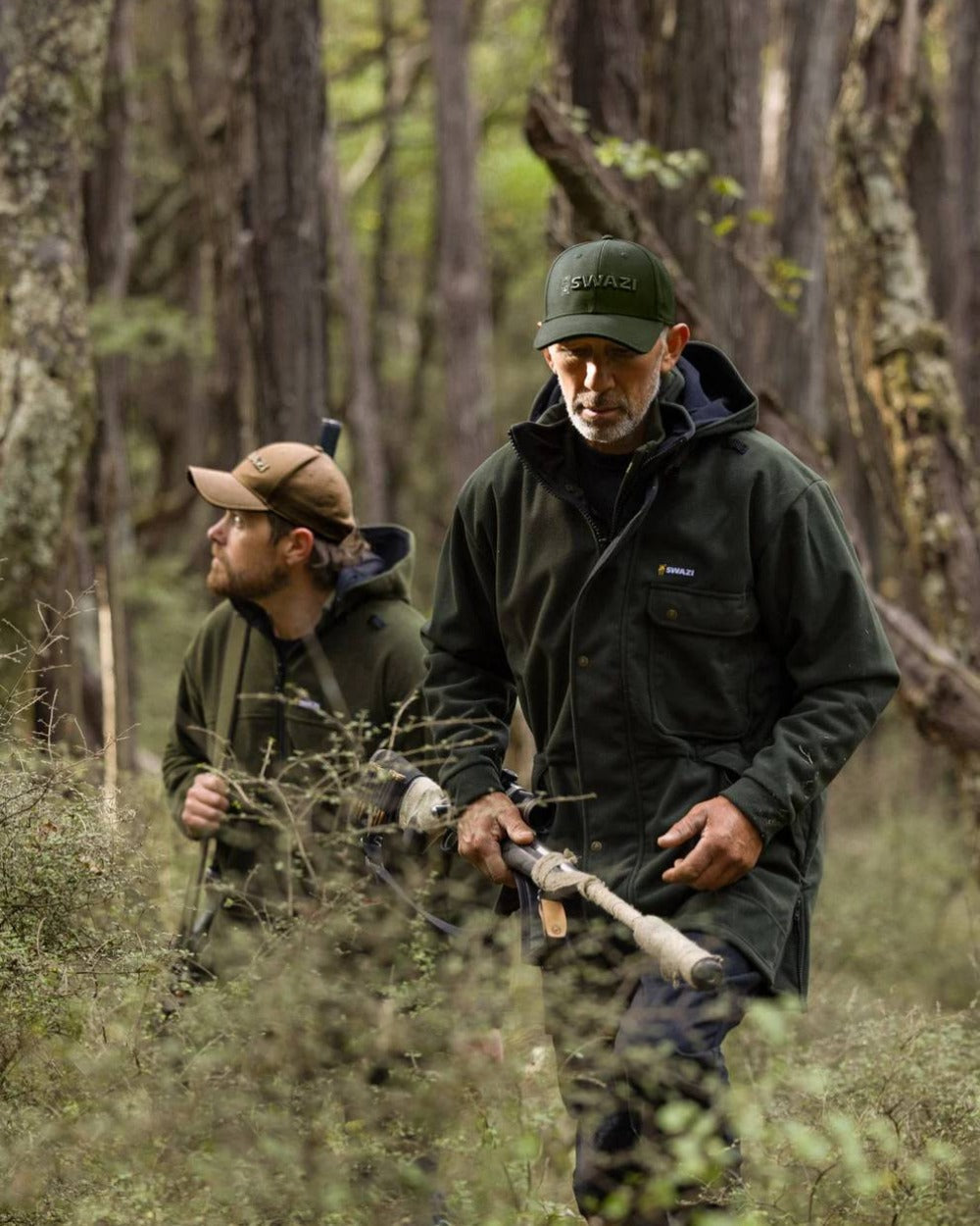 Olive coloured Swazi Legend Cap on forest background #colour_olive