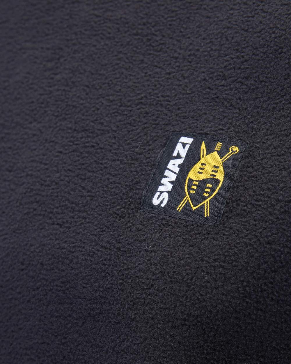 Black Coloured Swazi Long Sleeve Micro Top on white background #colour_black