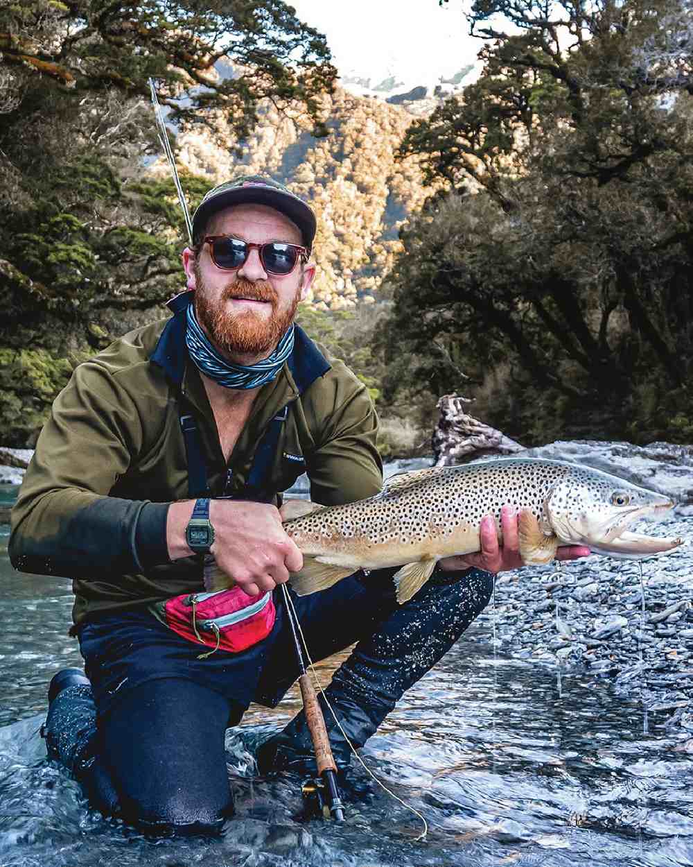 Olive coloured Swazi Mens Climb Max Long Sleeve Polo Shirt on sea background #colour_olive