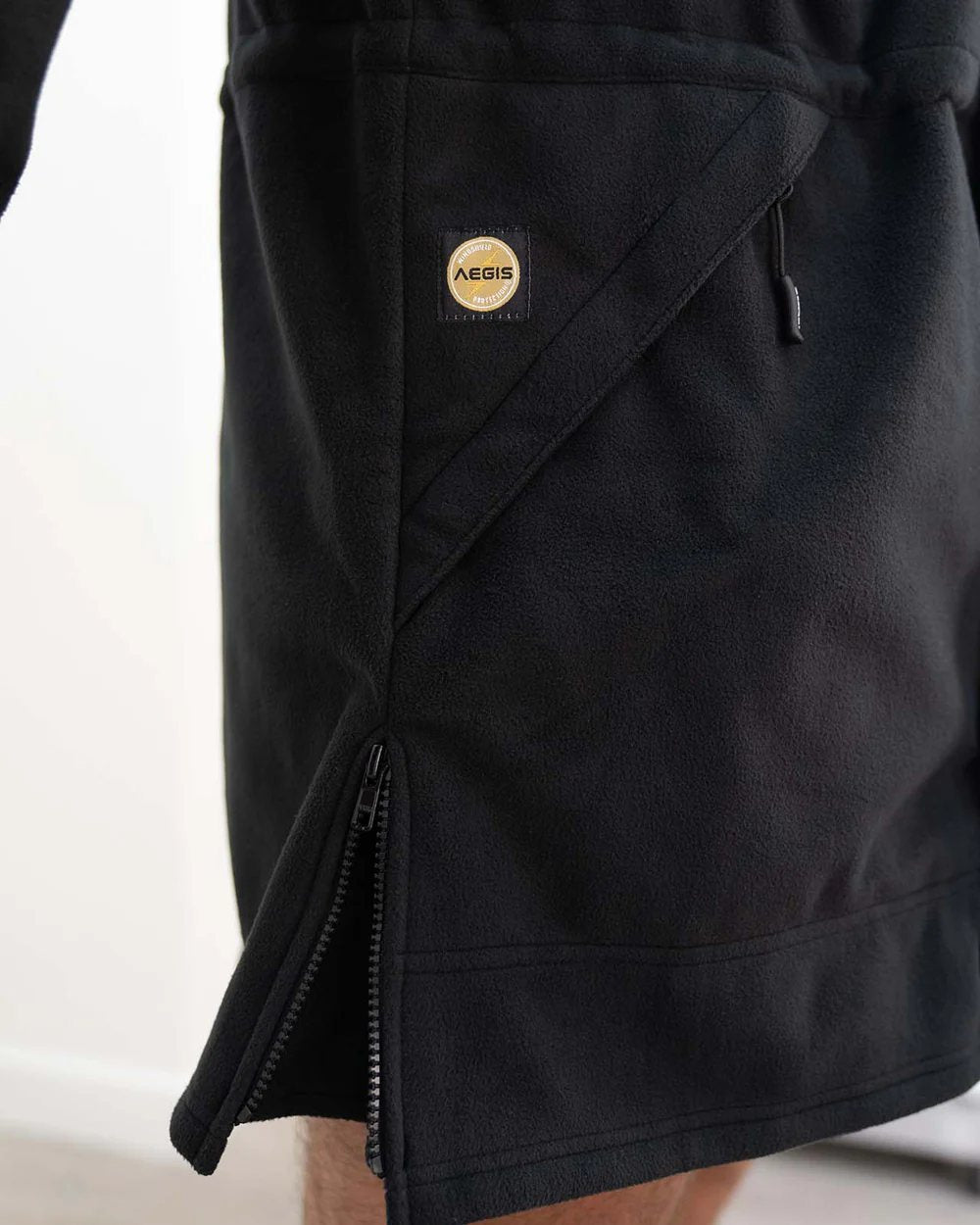 Black coloured Swazi Mens Windriver Jacket on floor background #colour_black