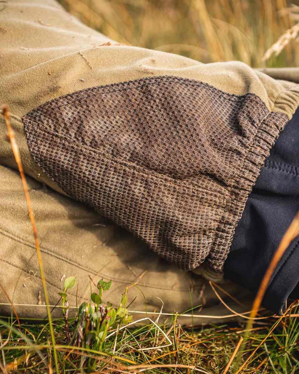 Tussock Green Coloured Swazi Overpants on outdoor background #colour_tussock-green