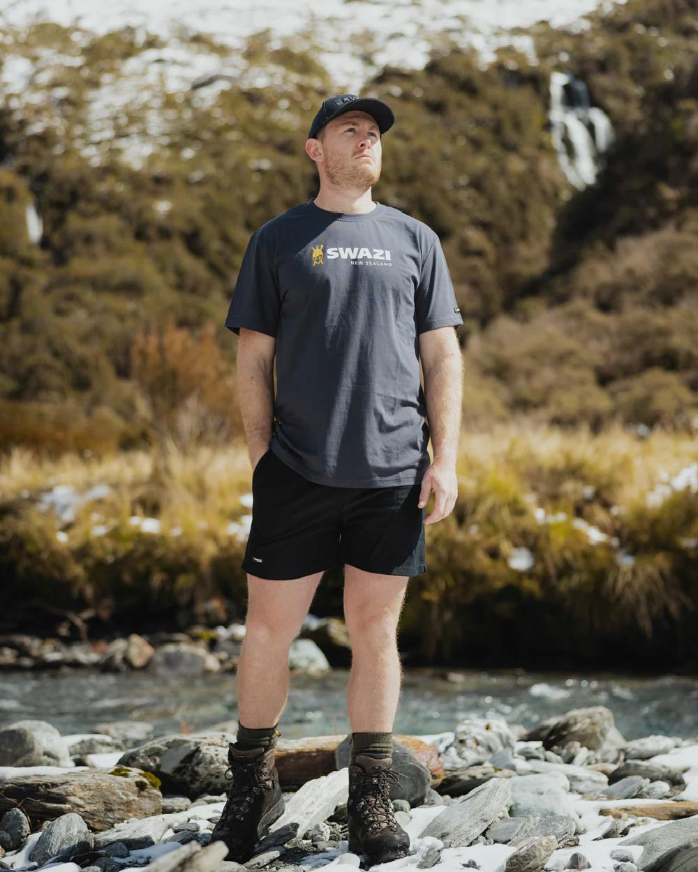 Granite Coloured Swazi Tee on forest background #colour_granite