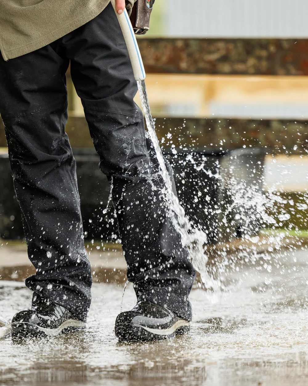 Black Coloured Swazi Torrent Overpants on water background #colour_black