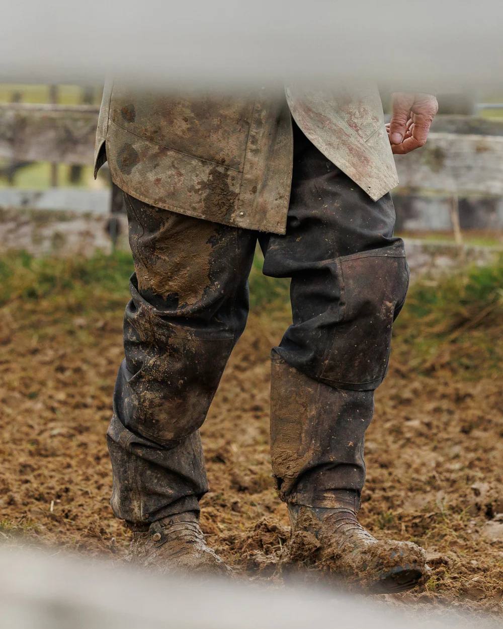 Black Coloured Swazi Torrent Overpants on land background #colour_black