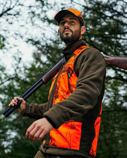 Tarmac Green Coloured Deerhunter Eagle Fleece Jacket On A Forest Background #colour_tarmac-green