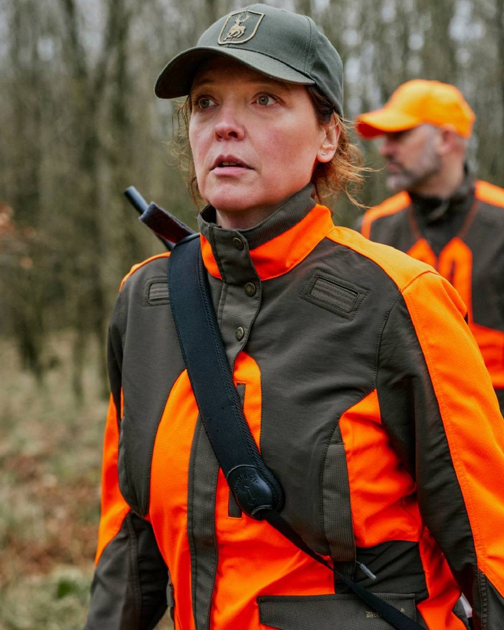 Timber coloured Deerhunter Shield Cap on blurry background #colour_timber