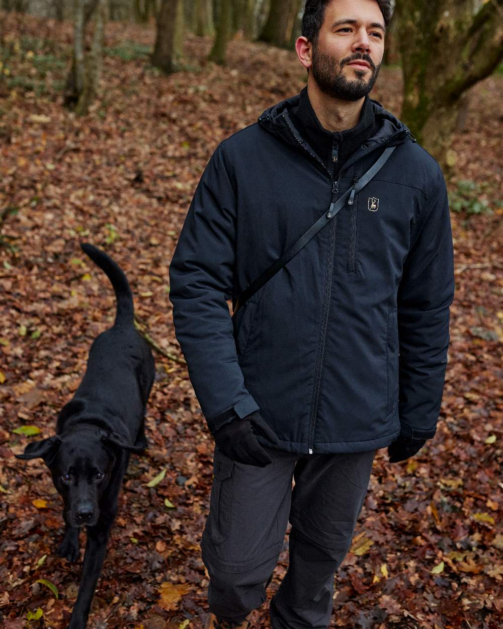 Black Ink coloured Deerhunter Slogen Zip-off Trousers on Forest background #colour_black-ink