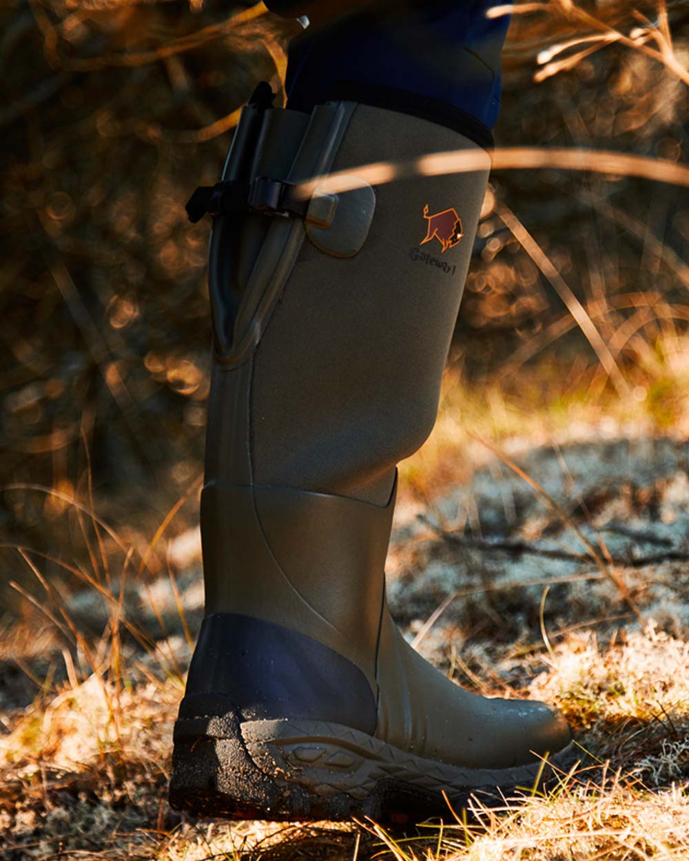 Khaki coloured Gateway1 Woodwalker 18" 4mm Wellingtons on Trail  background #colour_khaki