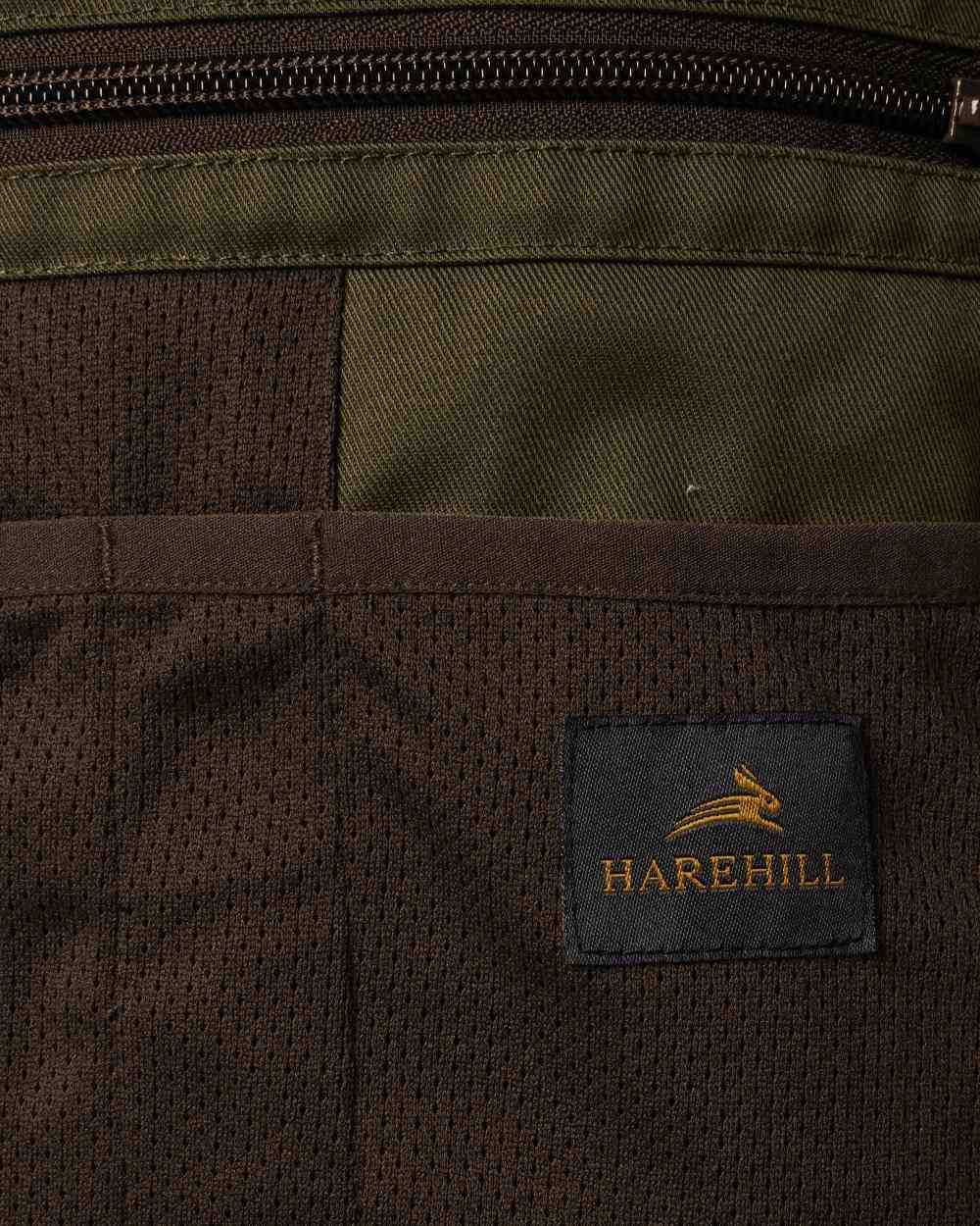 Forest Shade coloured Harehill Ridgegate Active Hybrid Jacket close up #colour_forest-shade