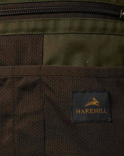 Forest Shade coloured Harehill Ridgegate Active Hybrid Jacket close up #colour_forest-shade