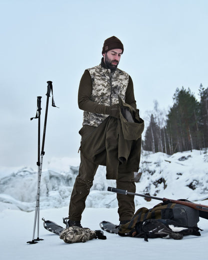 AXIS Mountain Coloured Harkila Camo HSP Insulated Waistcoat on snow background #colour_axis-mountain