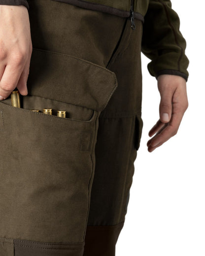 Willow Green Deep Brown Coloured Harkila Womens Scandinavian Pants On A White Background #colour_willow-green-deep-brown