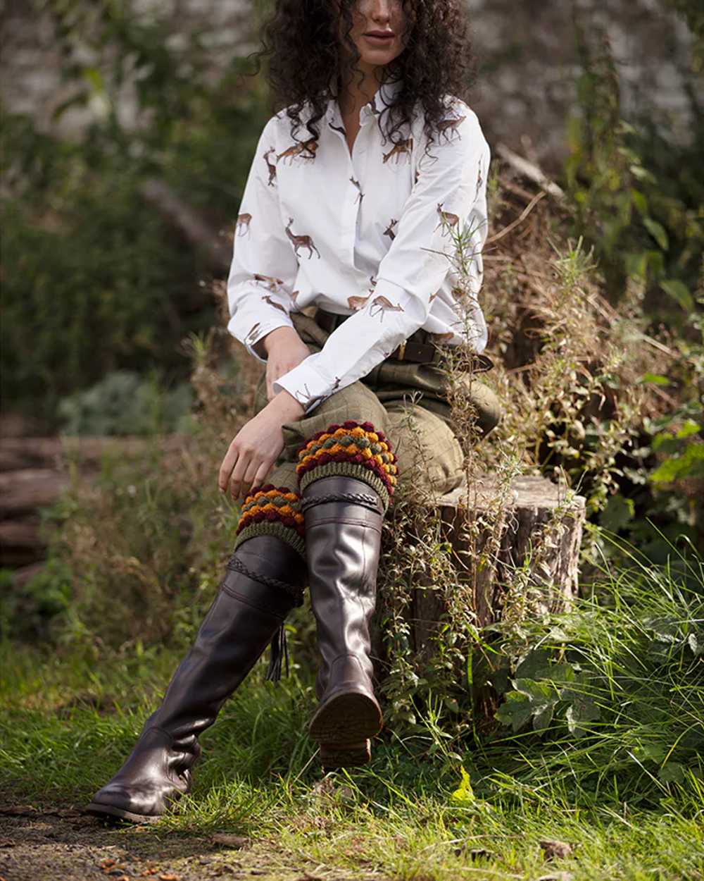 Dark Olive coloured House of Cheviot Lady Angus Shooting Socks on outdoor background #colour_dark-olive