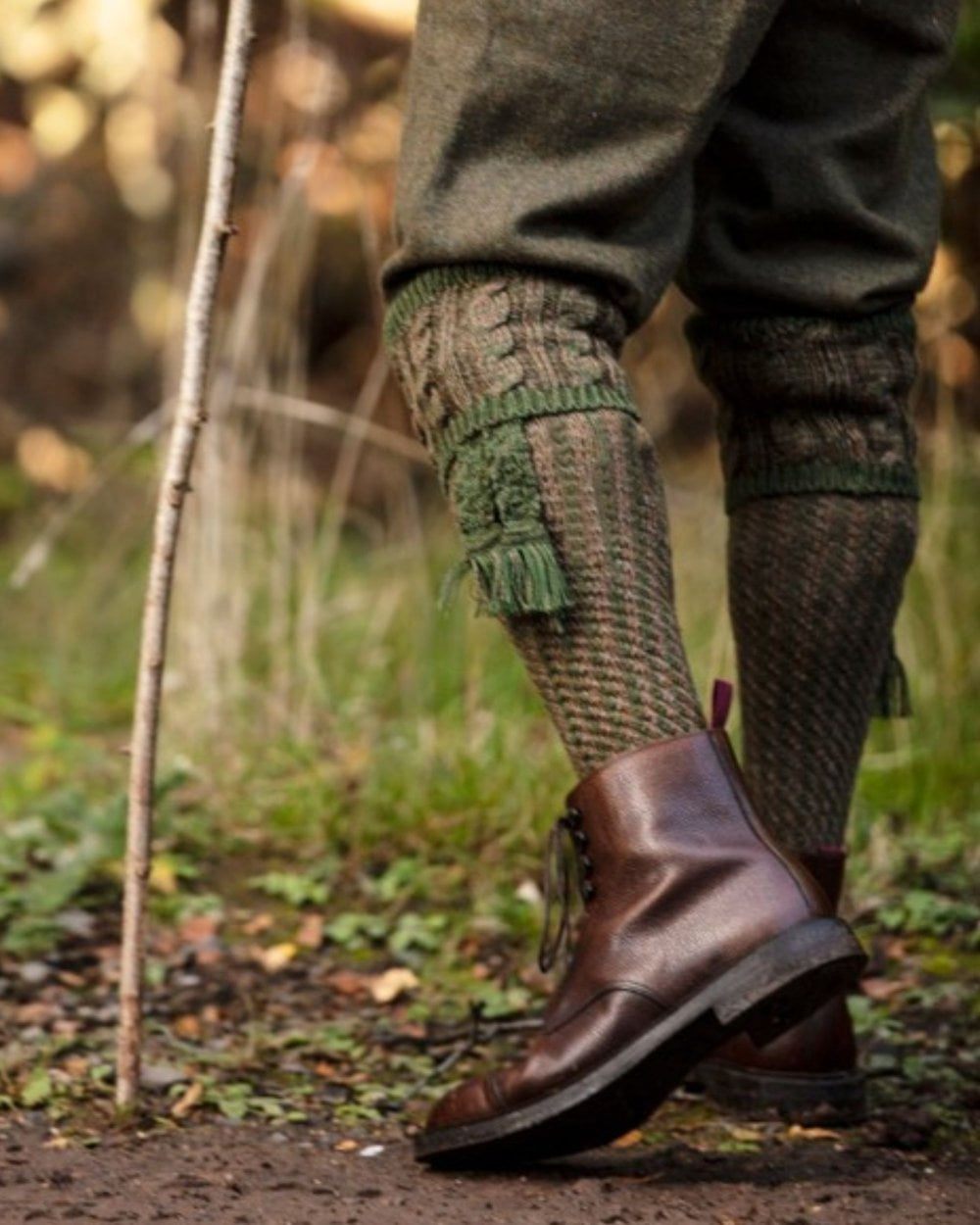 Hawthorn coloured House of Cheviot Reiver Socks on outdoor background #colour_hawthorn