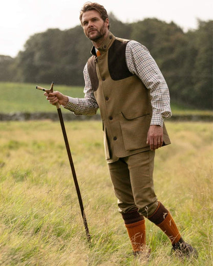 Ochre coloured House of Cheviot Tayside Socks on field background #colour_ochre