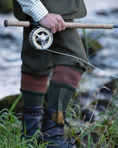 Spruce coloured House of Cheviot Tayside Socks on outdoor background #colour_spruce
