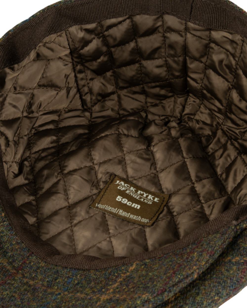 Brown Coloured Jack Pyke Wool Blend Tweed Flat Cap On A White Background #colour_brown