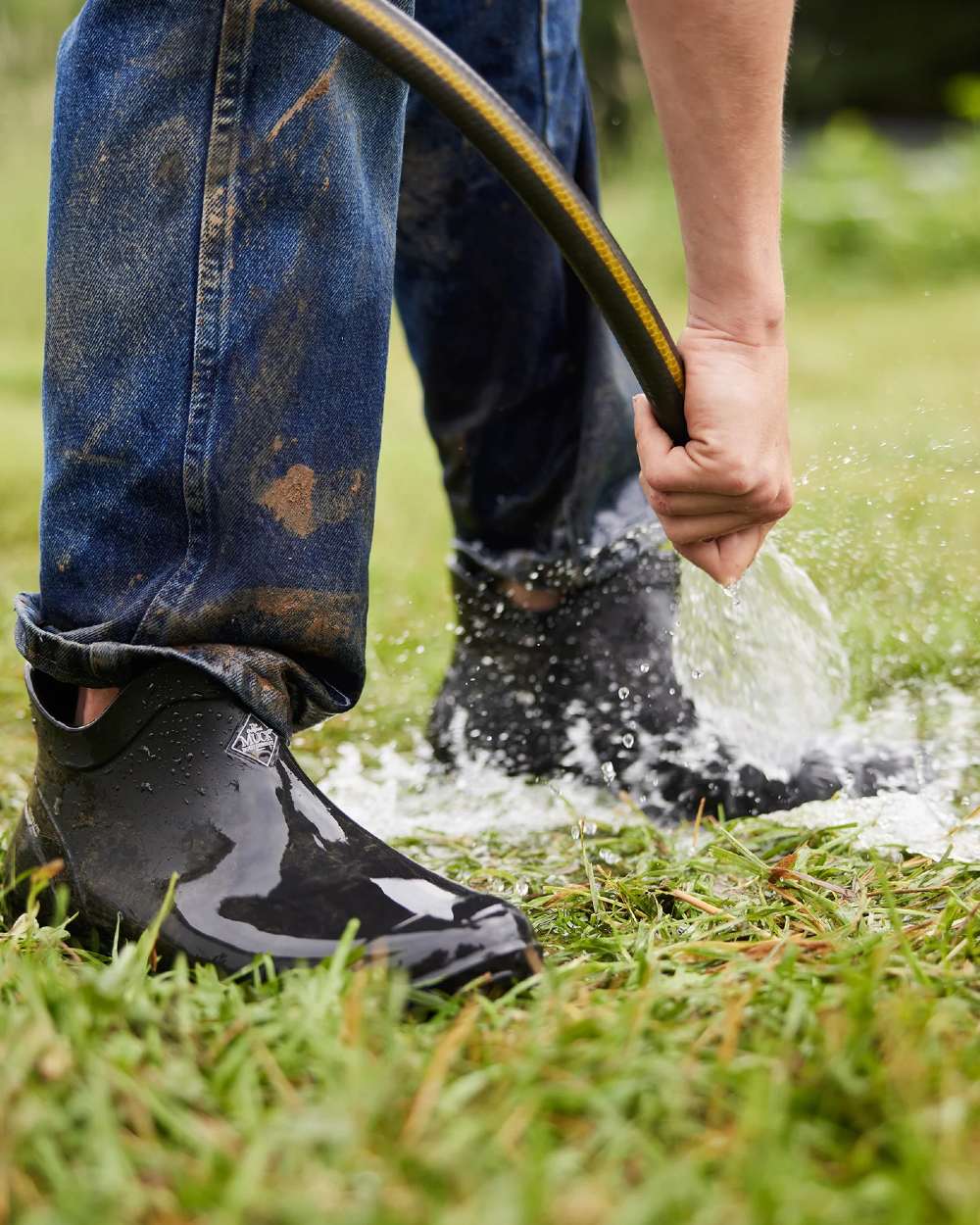 Black Coloured Muck Boots Mens Muckster Lite Ankle Boots On A Garden Background #colour_black