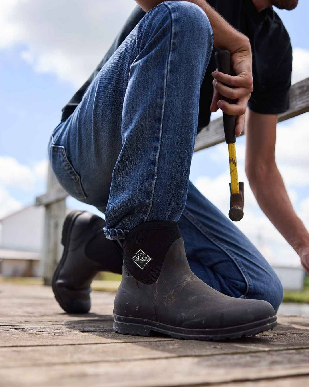Black Coloured Muck Boots Mens Originals Excursion Ankle Boots on Outdoor Background
#colour_black