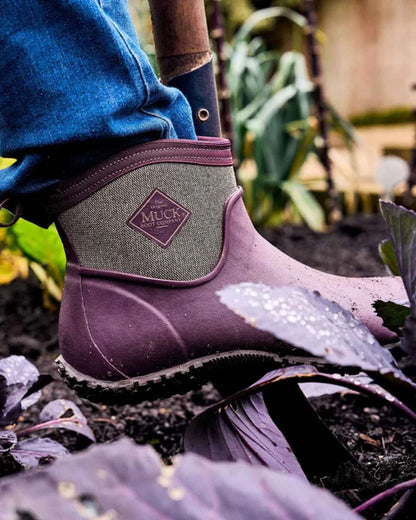 Wine Herringbone Print Coloured Muck Boots Women's RHS Muckster II Ankle Boots on Outdoor Background
#colour_wine-herringbone-print