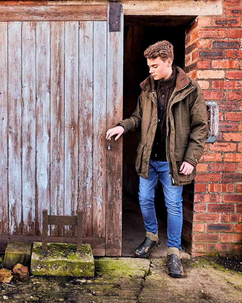 Moss Coloured Muck Boots Mens Woody Sport Ankle Boots On A Shelter Background #colour_moss