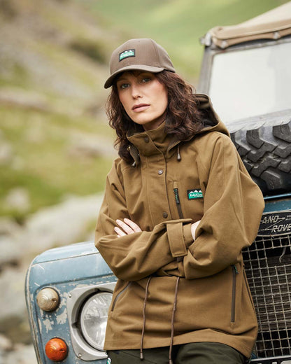 Teak Coloured Ridgeline Ladies Monsoon II Waterproof Smock On A Hill Background #colour_teak