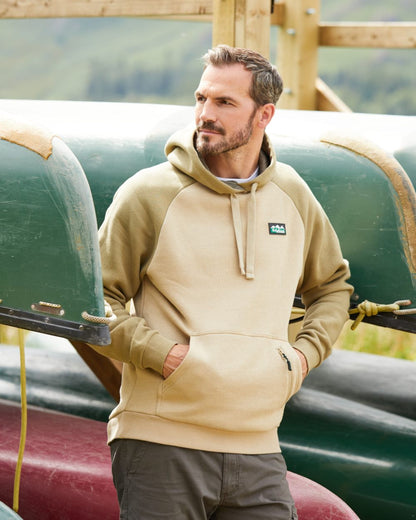 Teak Coloured Ridgeline North Island Hoodie on outdoor background #colour_teak