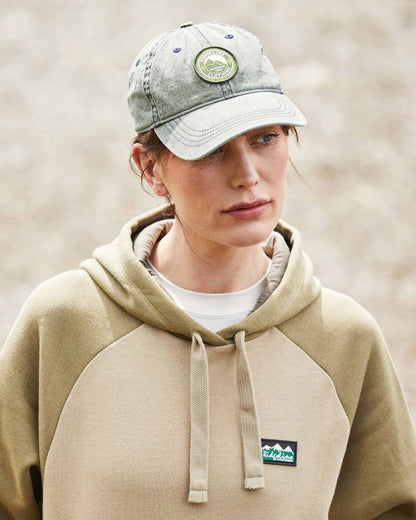 Olive Wash Coloured Ridgeline Original Truckie Cap On A Blurry Background #colour_olive-wash