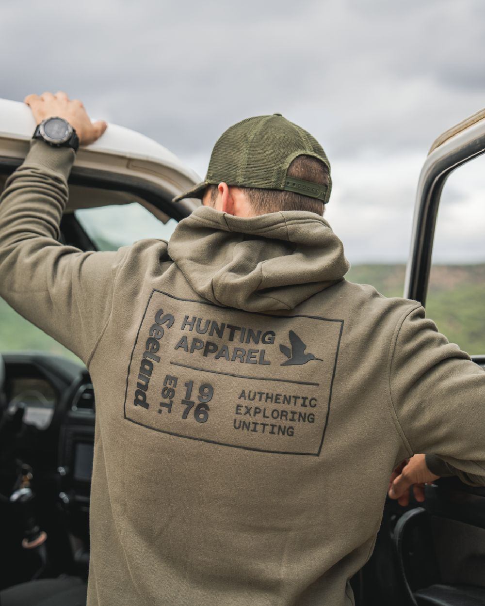 Grape Leaf Coloured Seeland Delta Hoodie on Outdoor Background
#colour_grape-leaf