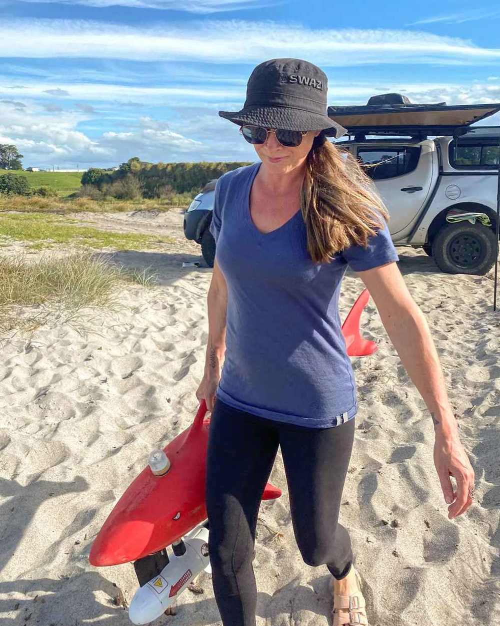 Black Coloured Swazi Bucket Hat On A Sand Background #colour_black