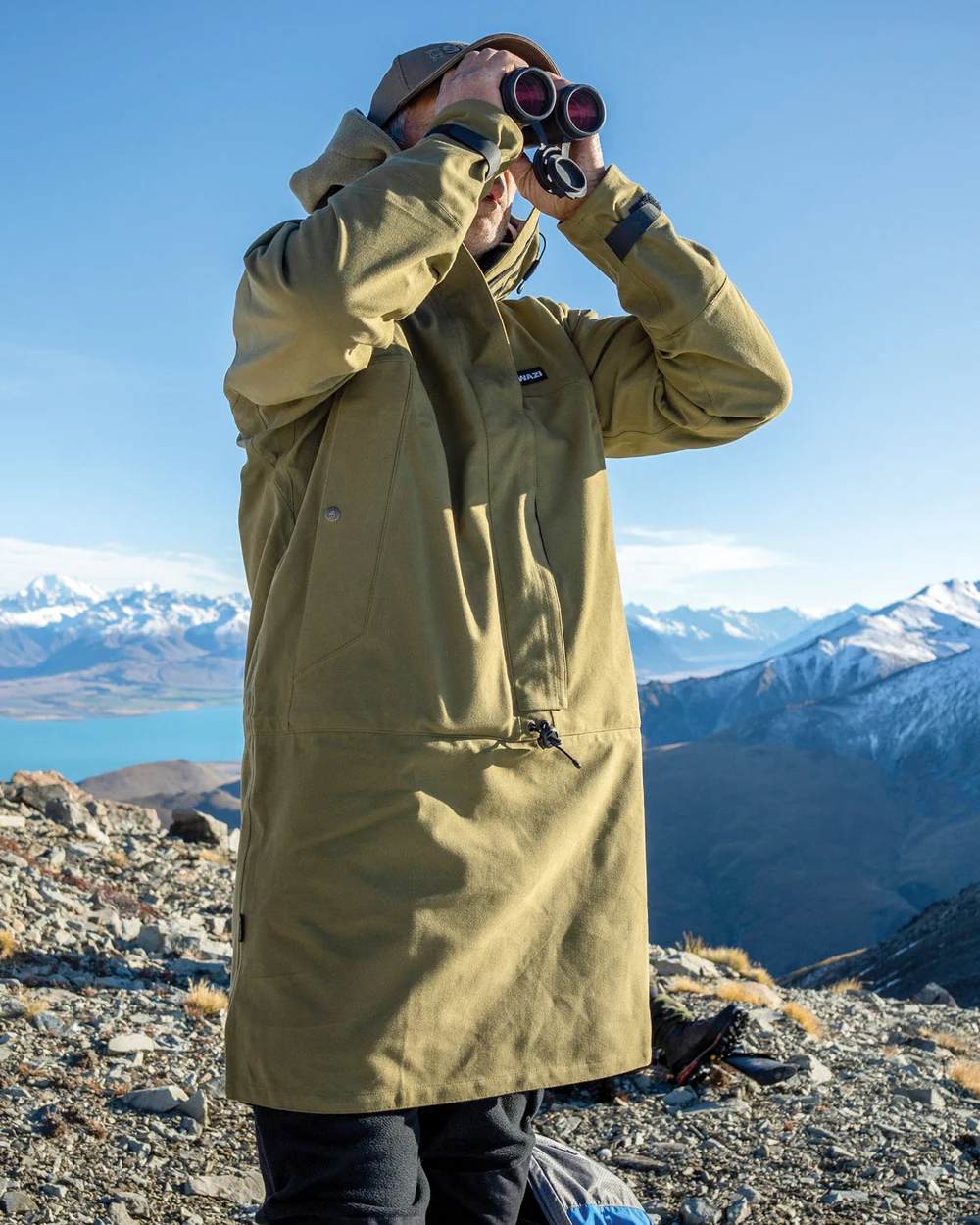 Tussock Green Coloured Swazi Tahr Xp Smock on mountain background #colour_tussock-green